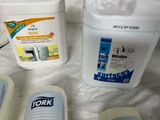 several different types of cleaning products on a table