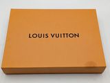 a close up of a box with a louis vuitton logo on it