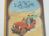 un vieux livre pour enfants avec l'illustration d'une jeep roulant dans le désert