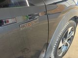 a close up of a car door with a sticker on it