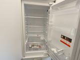 an image of a refrigerator with its door open