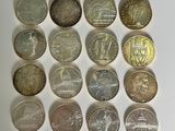 a lot of coins that are on the table
