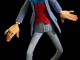 a figurine of a man in a suit and tie on a black surface