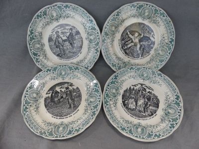 four blue and white plates with pictures of people and animals on them