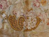 a picture of a painting of a boat with flowers on it