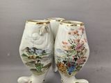 une paire de vases en porcelaine ornés d'oiseaux et de fleurs