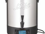 an image of a large stainless steel pot with a digital timer on it