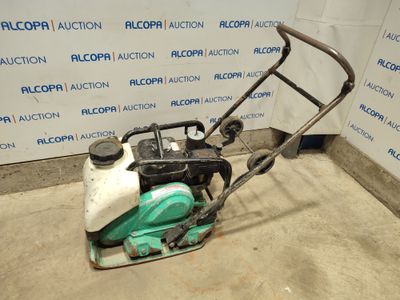 an image of a lawn mower in a garage