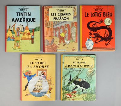 Quatre livres pour enfants sont alignés sur une table