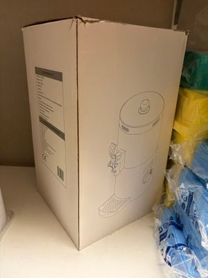 a box that is sitting on a counter next to a toilet