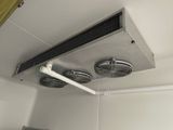 two fans that are attached to the ceiling in the bathroom