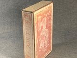 a small box with a picture of a woman on it