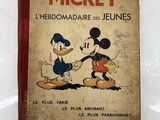 Un livre mettant en scène Walt et Mickey Mouse sur un fond blanc