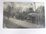 a black and white photo of a group of people on a road