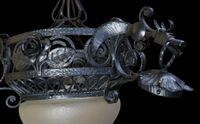 LUSTRE en fer forgé à trois lumières retenues par des dragon… (photo 2)