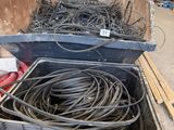 two boxes with wires in them in a warehouse
