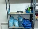 a shelf with many items on it in a room