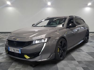 an image of a grey car in a showroom