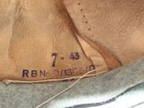 a close up of a baseball glove with a number on it