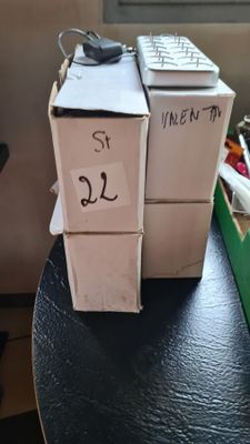 two boxes that are sitting on top of a table