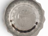 a glass plate with a design on it on a white surface