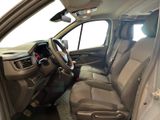 a view of the inside of a car from the driver ' s seat