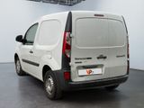 a white van that is parked in a room