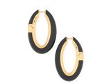 a pair of black and gold hoop earrings on a white background