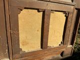 a picture of a wooden window with some paint on it