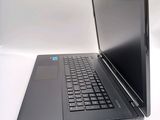 a laptop computer that is sitting on a table