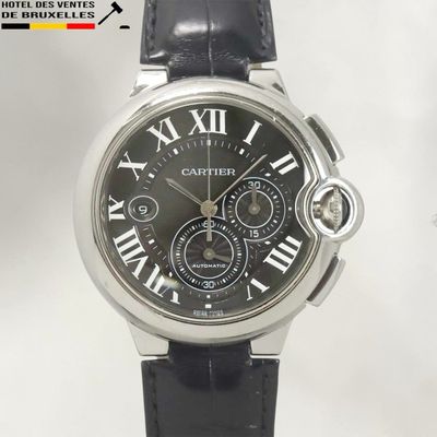 the watch is black with roman numerals and roman numerals on the dial