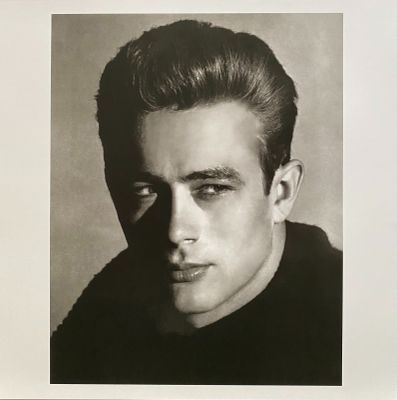 black and white photograph of a man with a serious look on his face