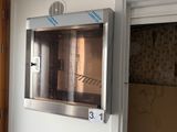 an image of a stainless steel oven in a kitchen
