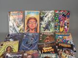 a lot of comic books sitting on a table