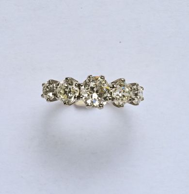 Bague Jarretière en or 18K (750/oo) de 2 tons centrée d'un d…