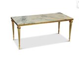 une image représentant une table avec un plateau en marbre et des pieds dorés