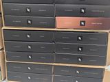 several boxes are stacked on top of each other on a table