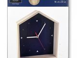 the clock is made of wood and has a black face and red hands