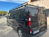a black van parked in front of a building