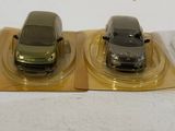 two cars that are sitting on top of each other