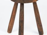 an image of a small wooden stool on a white background