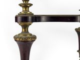 an image of a pair of candles on a table with a mirror