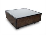table basse avec un plateau en verre et un piètement en bois