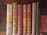 many books that are on a shelf together