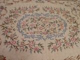 a picture of a rug with a floral design on it