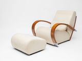 an image of a chair and ottoman in a white room