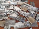 a lot of old photos on the table together