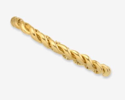 une image d'une bague en or sur fond blanc