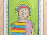 painting of a woman with a colorful headdress in a wooden frame