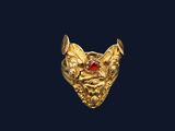 une image d'une bague en or avec une pierre rouge au centre